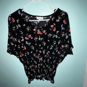 Black floral blouse